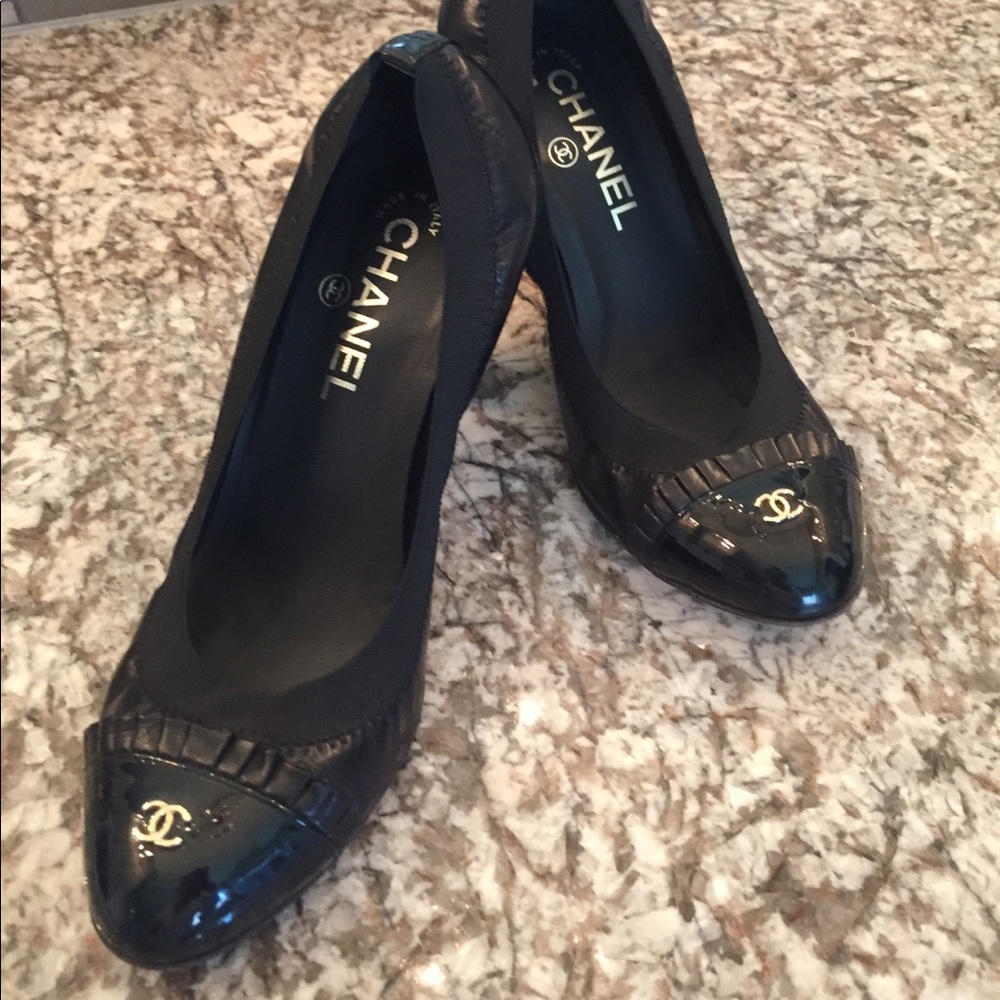 Black Chanel heels.